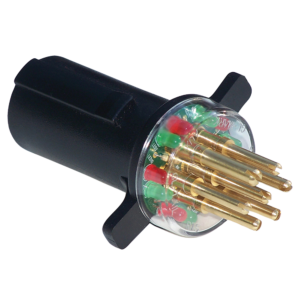 a close up of a black object with red green and gold wires