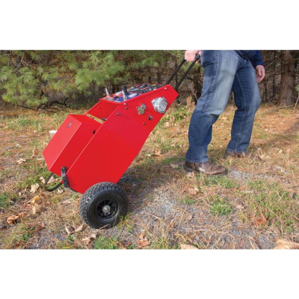 a man is pushing a red cart