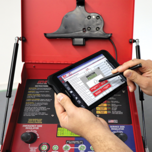 a person is using a tablet with a pen on it